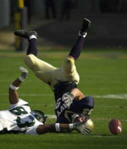 football-usa-sport-sports-tackle A tackle in American football